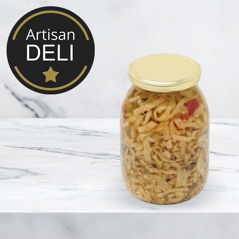 jar of italian aubergine strips in sunflower oil on marble background