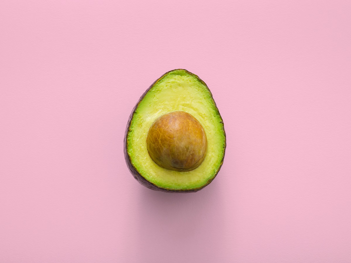 avocado on a pink background plant based recipes