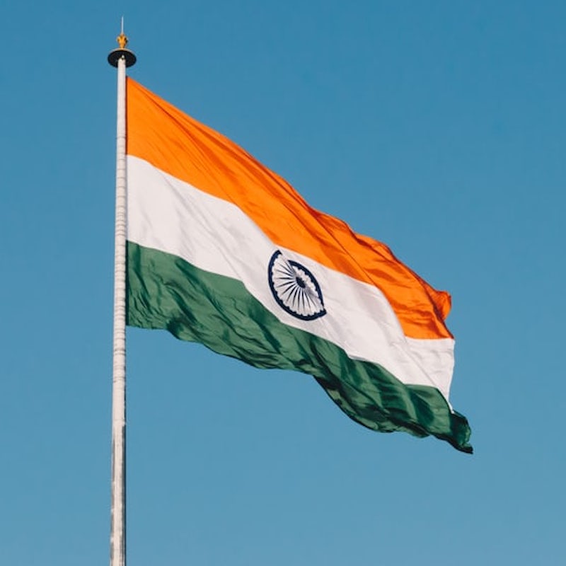 indian flag against a blue sky