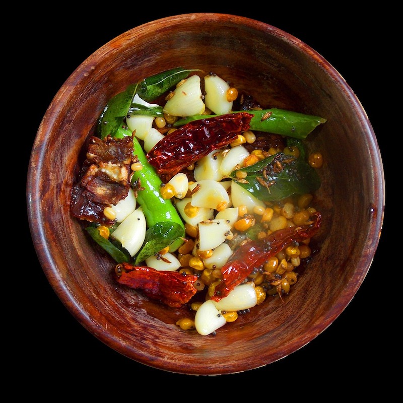 masala mogo spices in a ceramic brown bowl