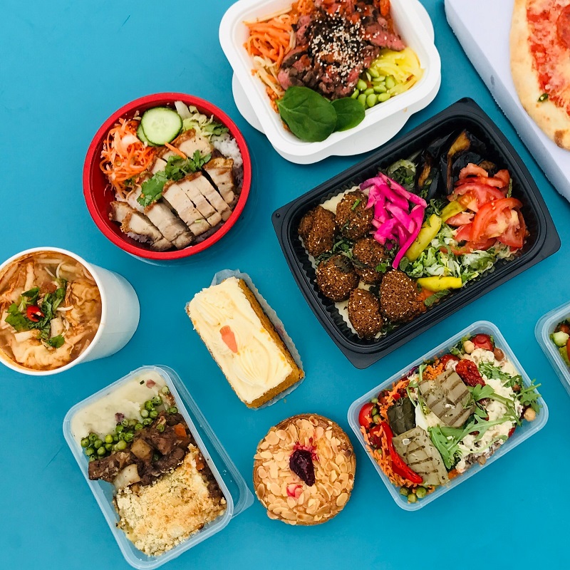 packed lunches laid out against a blue background